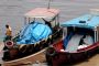 Amazonas06 - 003 * These boats bring ice to the local fish market.